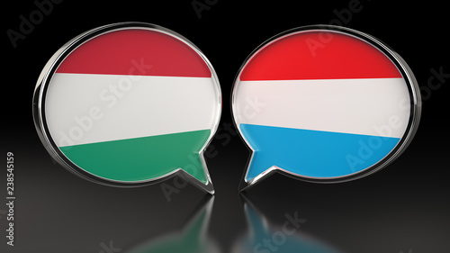 Hungary and United Kingdom flags with Speech Bubbles. 3D illustration Free Download Hungary and United Kingdom flags with Speech Bubbles. 3D illustration - GFXLoad