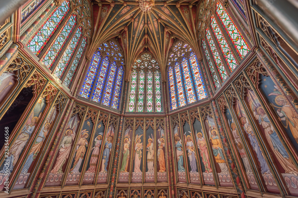 Magnificant stained glass and paintings under the cupola of Ely Cathedral inCambridgeshire in England.