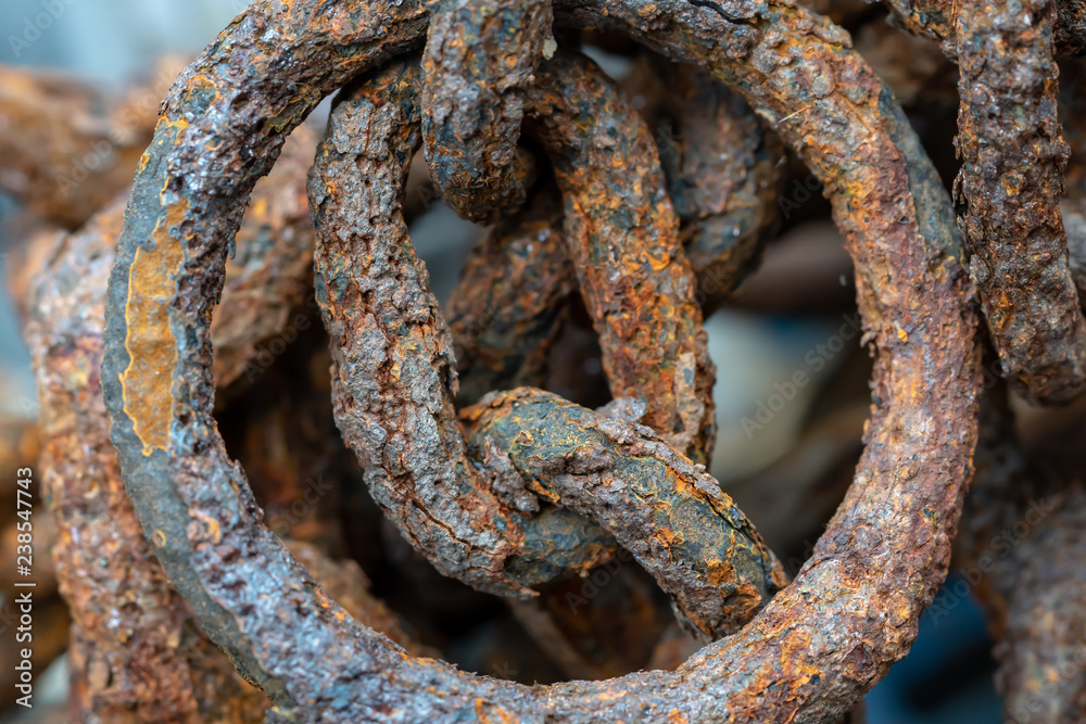 Rusty chains eroded by sea water Rusty chains eroded by sea water