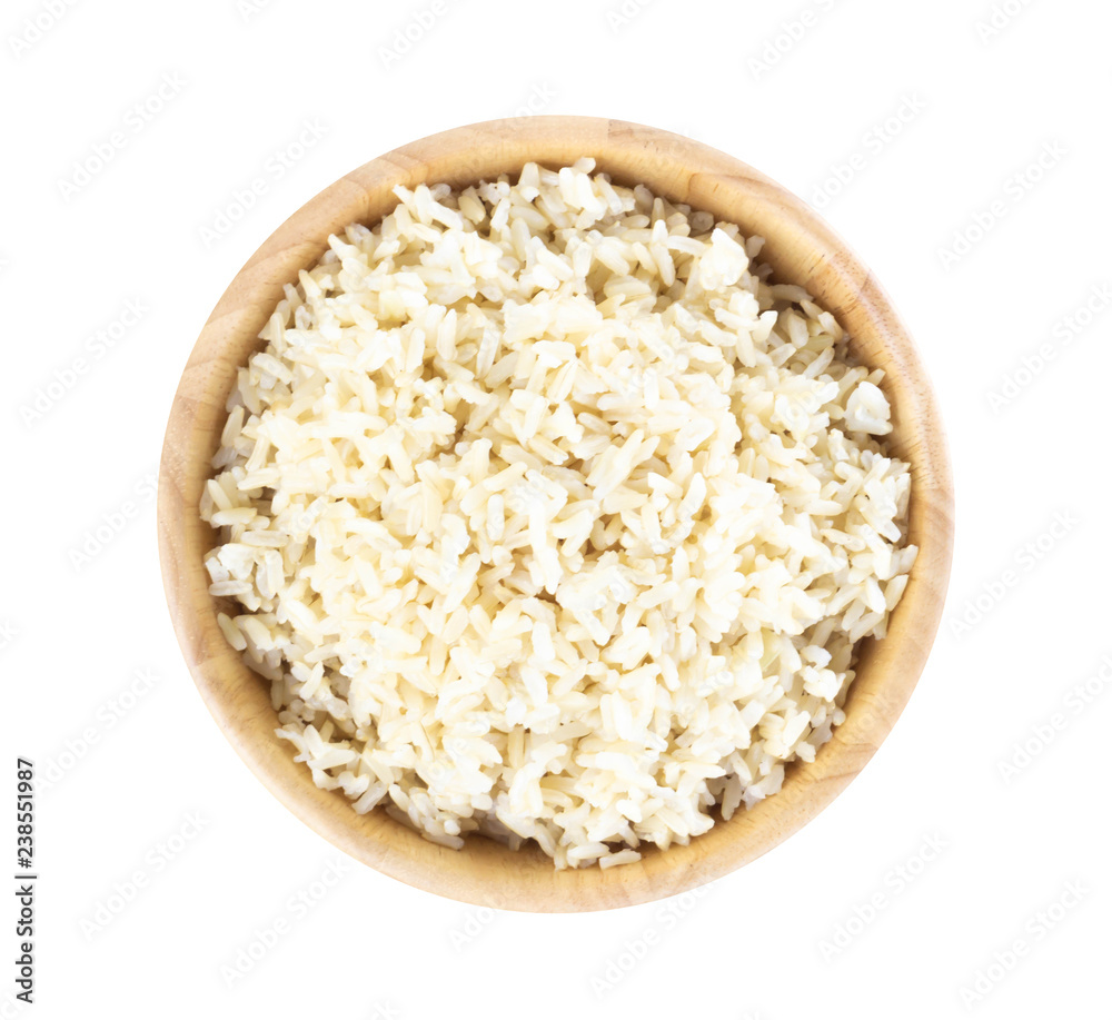 Top view brown rice in the wood bowl and spoon isolated on white background, healthy food conept Top view brown rice in the wood bowl and spoon isolated on white background, healthy food conept