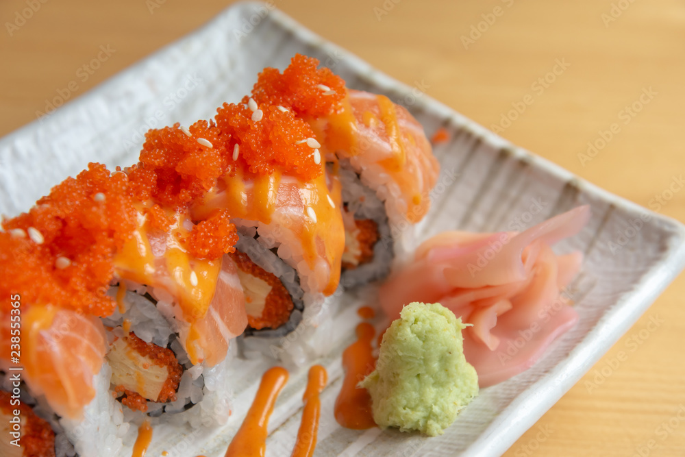 Sushi roll : Row of salmon sushi rolls. Sushi roll : Row of salmon sushi rolls.