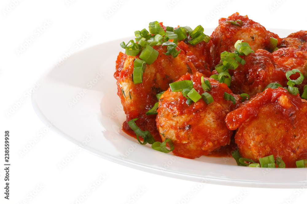 Meatballs in tomato sauce served on a plate. Isolated on white background. Meatballs in tomato sauce served on a plate. Isolated on white background.