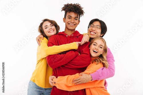 Group of cheerful teenagers isolated