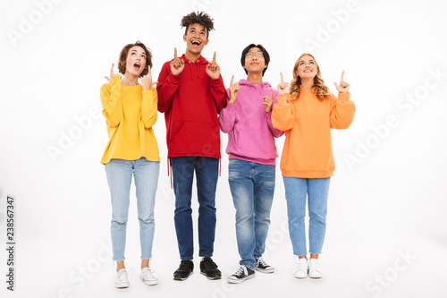 Group of cheerful teenagers isolated