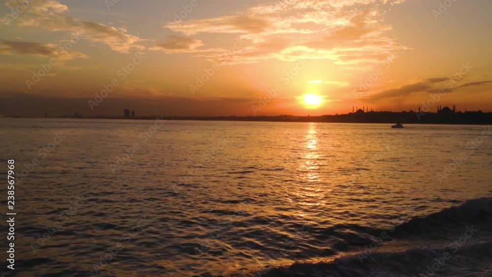 Sunset behind boat in ıstanbul, Marmara Sea Sunset behind boat in ıstanbul, Marmara Sea
