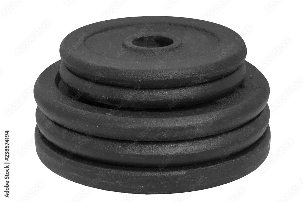 stack of different sizes dumbbell discs isolated on white background