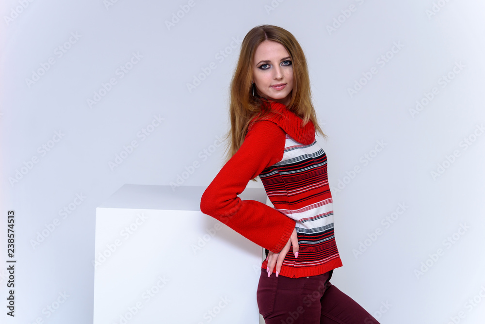 Concept portrait of a beautiful blonde woman girl on a white background in various poses Concept portrait of a beautiful blonde woman girl on a white background in various poses