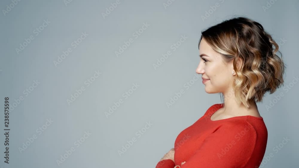 Side view portrait of beautiful young female looking forward Side view portrait of beautiful young female looking forward