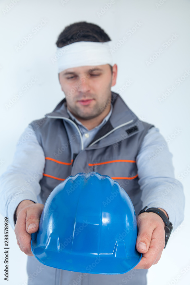 Engineer on white background wearing protective vest