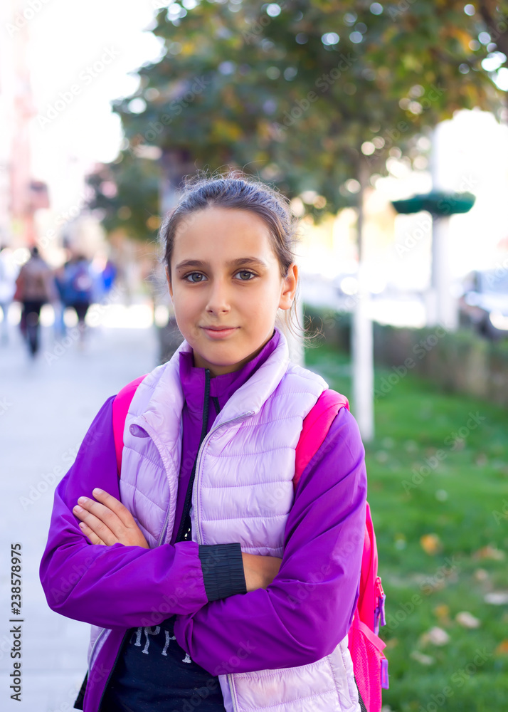 Teenager emotions - calm. Schoolgirl on town street. Teenager emotions - calm. Schoolgirl on town street.