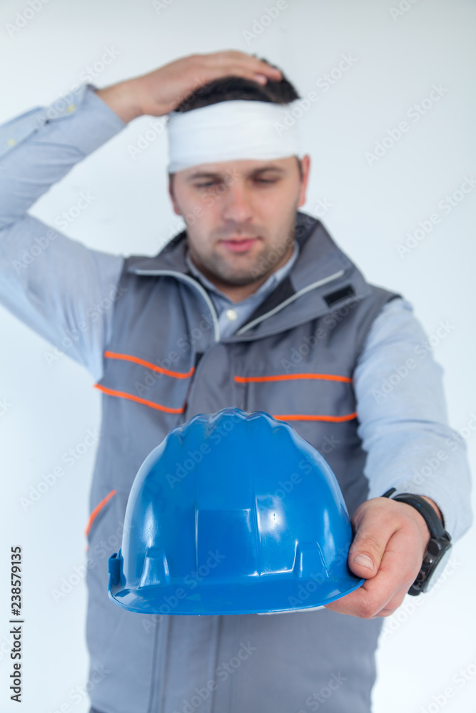 Engineer on white background wearing protective vest Engineer on white background wearing protective vest