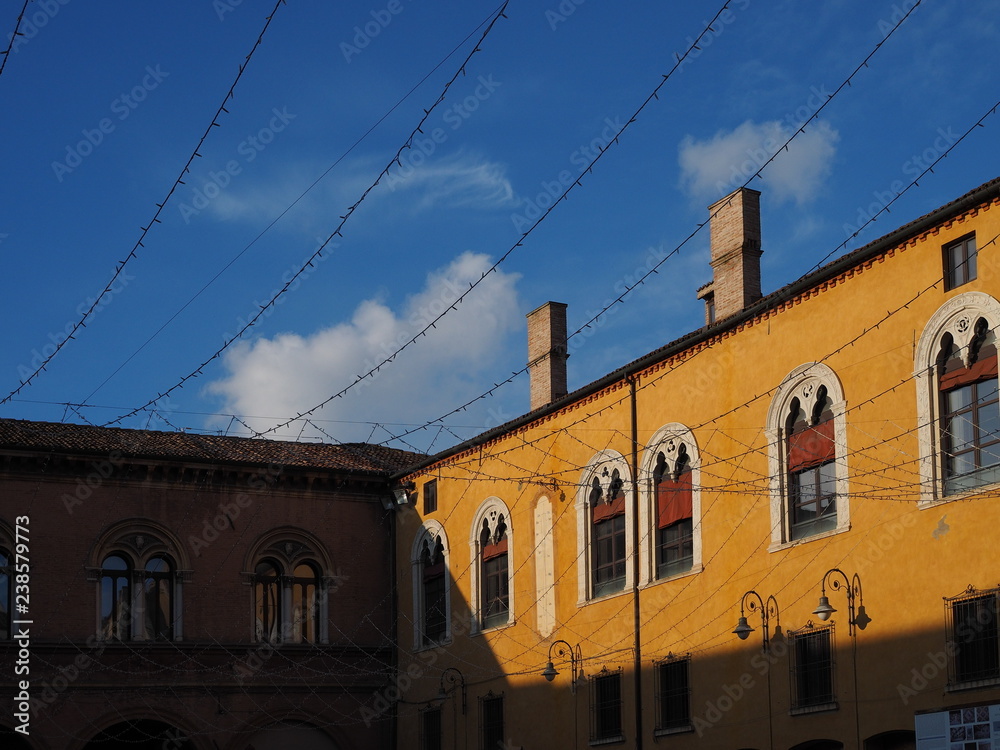 Ferrara, Italy.  Municipal square and wires of Christmas illuminations.