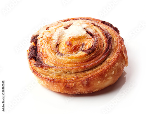 Sweet bun with cinnamon isolated on white