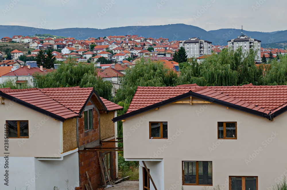 A residential district of contemporary macedonian  houses in  town Delchevo among Maleshevo and Osogovo mountains, Macedonia, Europe 