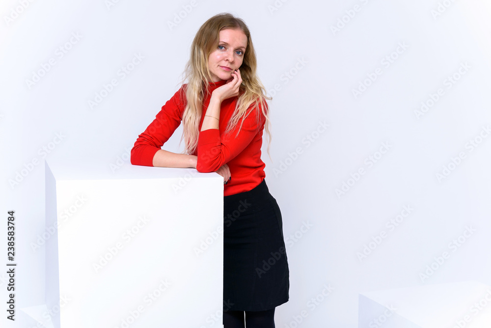 Concept portrait of a beautiful blonde woman on a white background in various poses. Concept portrait of a beautiful blonde woman on a white background in various poses.