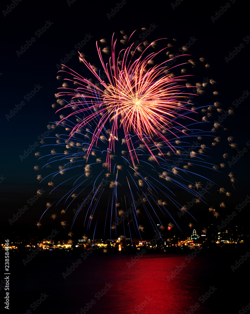 fireworks in the night sky with reflection fireworks in the night sky with reflection