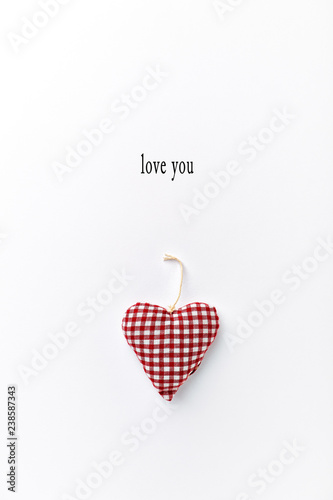 Hand crafted heart on white background. Valentine's day concept. Copy space © B.G. Photography
