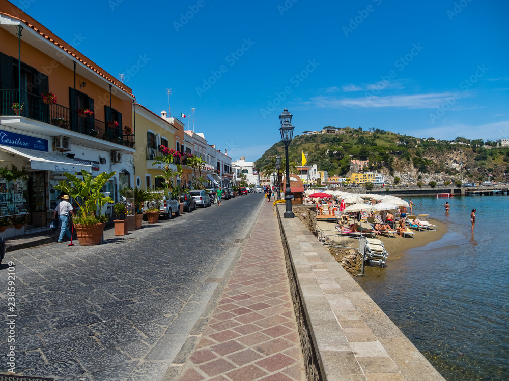 Lacco Ameno, Corso Angelo Rizzoli, beach with colorful houses and restaurant, island of Ischia, Naples, Gulf of Naples, Campania, Italy