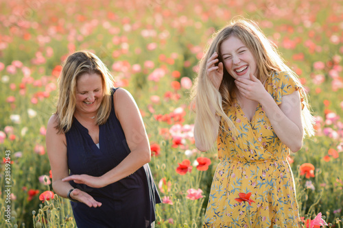 mother and daughter in flowers