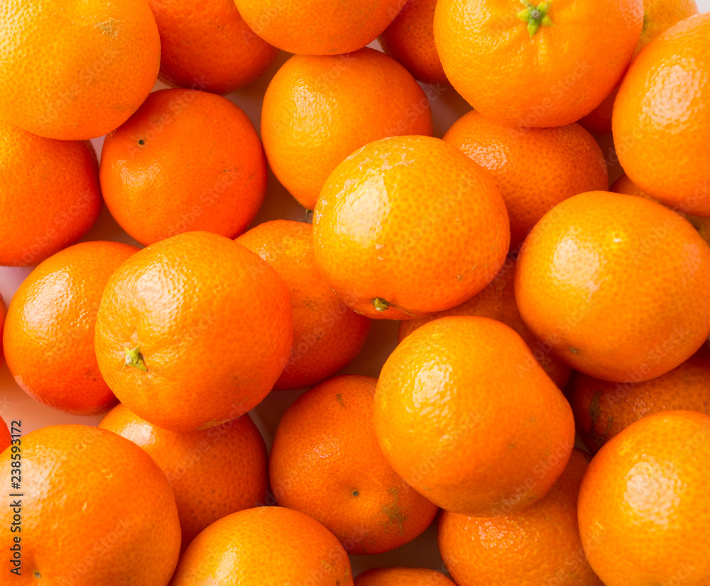 Top view. Fresh tangerines. Ripe and tasty mandarins. Clementines. Background tangerines. Top view. Fresh tangerines. Ripe and tasty mandarins. Clementines. Background tangerines.