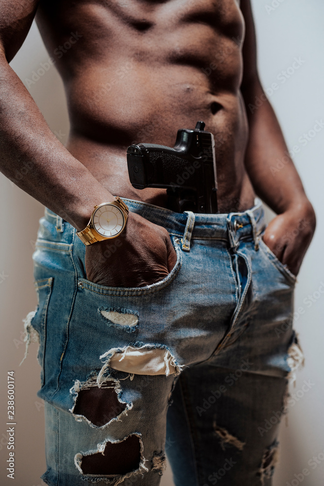 Anonymous black man with gun Stock Photo Adobe Stock
