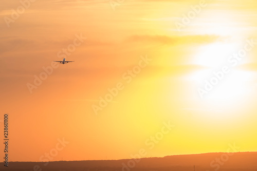 Take-off plane from the airport in Varna  shot at sunset.