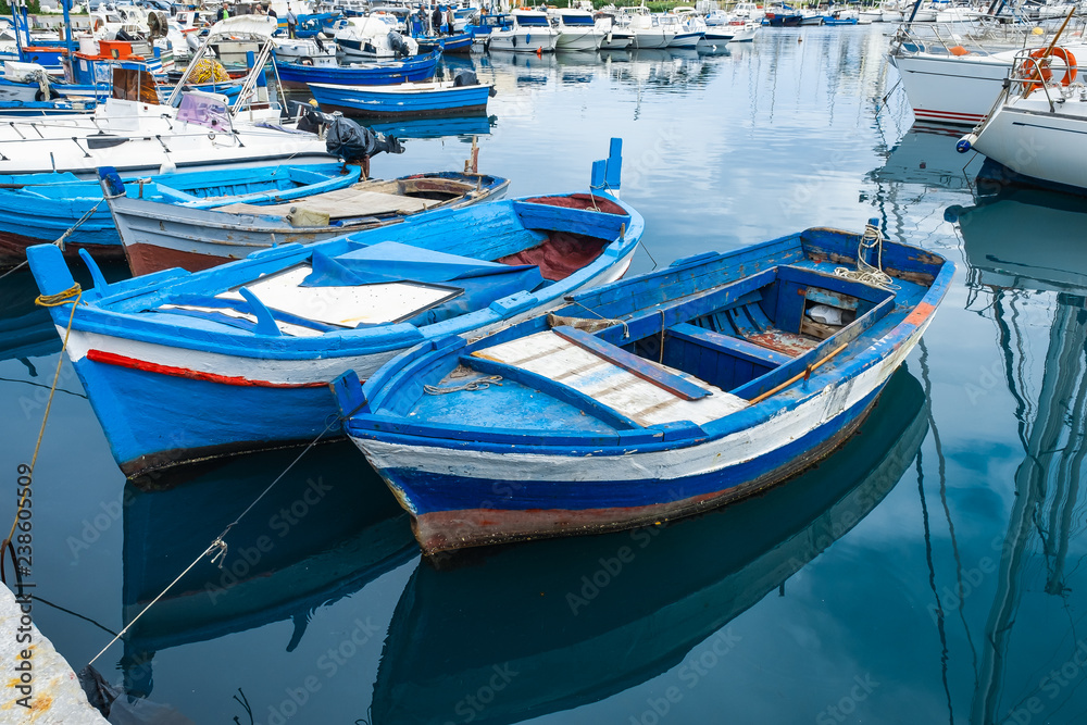Wooden fishing boats on the old port in Palermo, Sicily