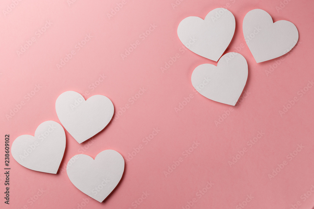 Valentine's Day postcard. Valentine's Day Background. Hearts on pink background. Copy space. Top view. Flat lay. Pastel colors
