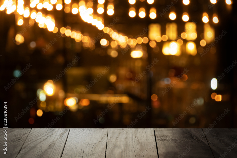top of black wood table with blur bar or pub night Christmas party  background Stock Photo | Adobe Stock
