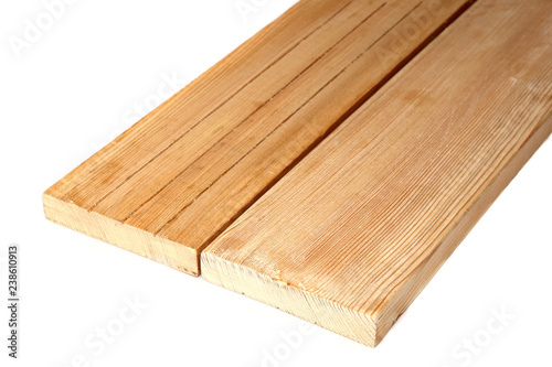 Two larch wood plank boards isolated on white background. Wood planks close up view.