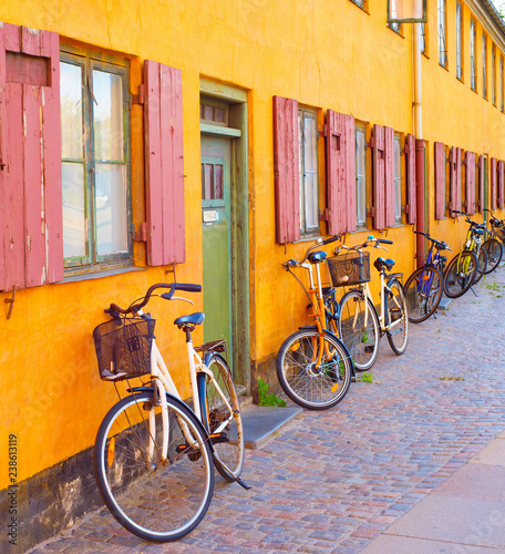Bycicles old building wall....