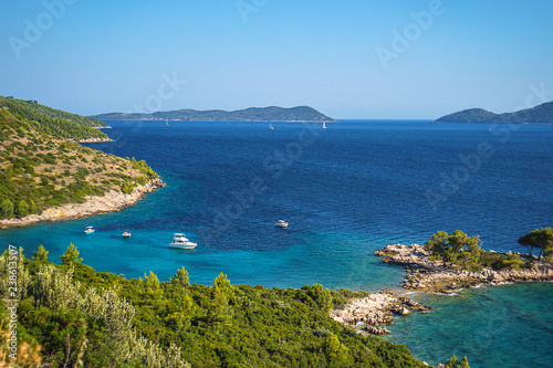 Aerial seascape view to turquoise waters of Adriatic Sea and islands, near town Dubrovnik in Croatia. Famous sailing travel destination in Croatia, Dubrovnik summer scenery in Europe.