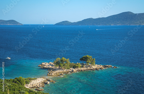 Aerial seascape view to turquoise waters of Adriatic Sea and islands, near town Dubrovnik in Croatia. Famous sailing travel destination in Croatia, Dubrovnik summer scenery in Europe.