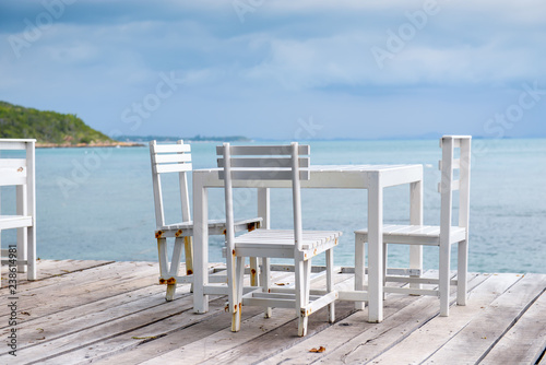 White wooden table and chairs.