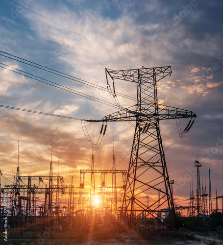 High-voltage power lines. Electricity distribution station. high voltage electric transmission tower. Distribution electric substation with power lines and transformers