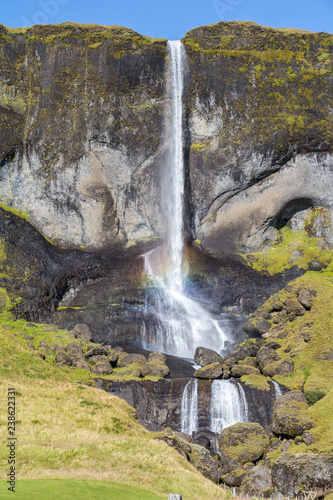 Beautiful waterfall with rainbow on ring road  Iceland