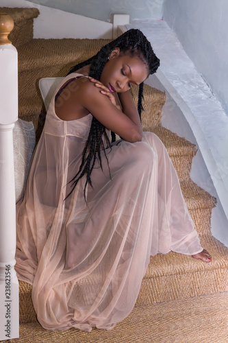 Depressed woman in nightgown