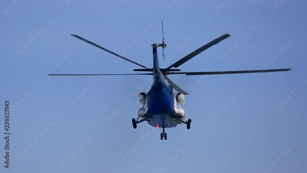 Civil transport helicopter climb altitude after taking off from the snow ground of the airfield Civil transport helicopter climb altitude after taking off from the snow ground of the airfield