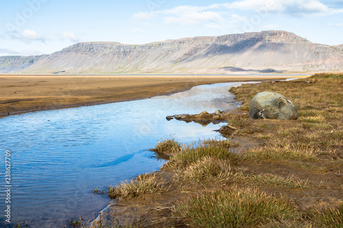 Scenic landscape of Raudisandur beach, west fjords, Iceland photo