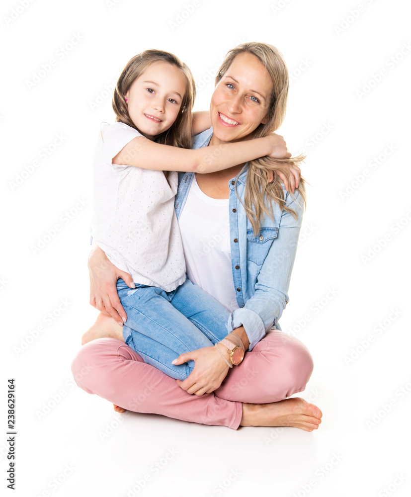 A mother and daughter portrait isolated on white studio. A mother and daughter portrait isolated on white studio.