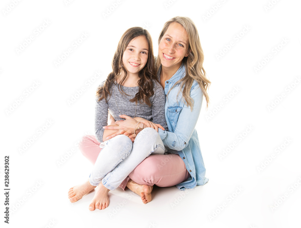 A mother and daughter portrait isolated on white studio.