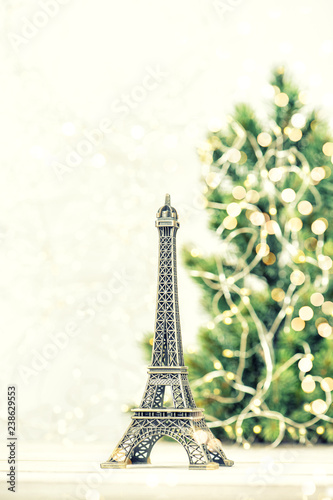Fototapeta Naklejka Na Ścianę i Meble -  Eiffel Tower Christmas tree decoration golden lights Paris France