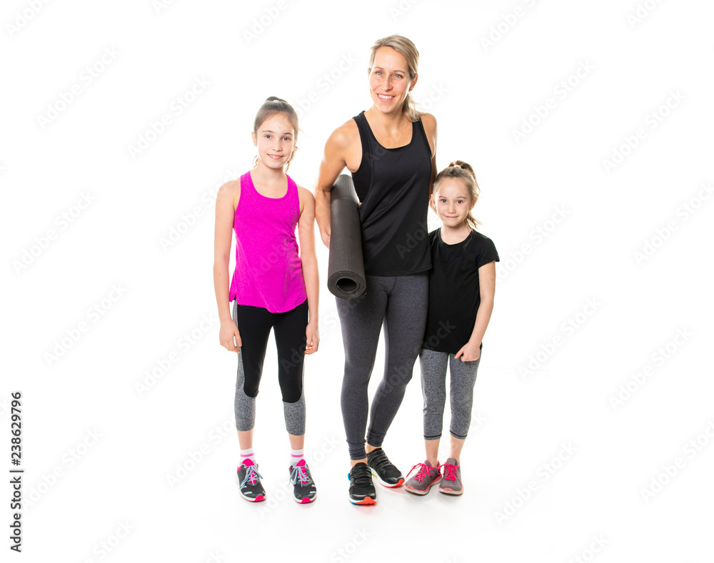 Fototapeta premium A Proud to be strong and healthy. Happy sporty family on studio white background