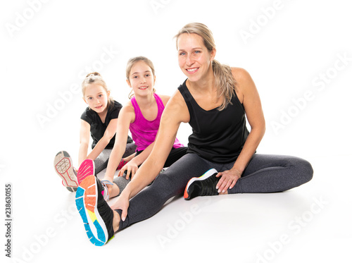 A Proud to be strong and healthy. Happy sporty family on studio white background