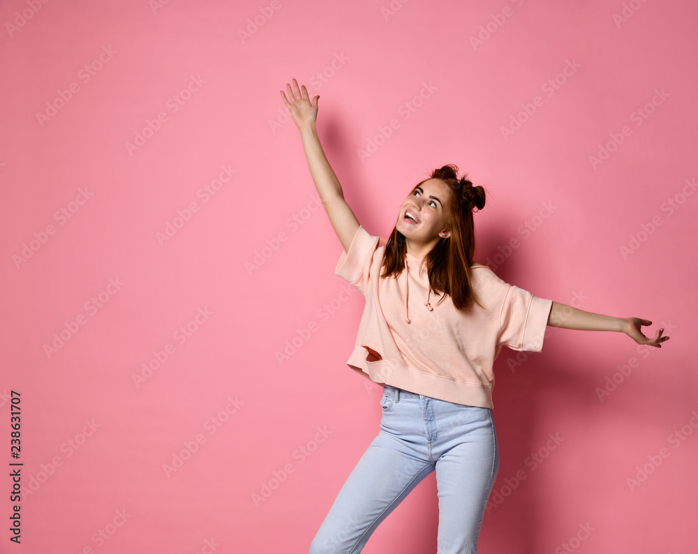 portrait of a cheerful woman waving her hands on top portrait of a cheerful woman waving her hands on top