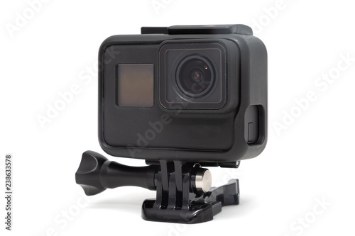 New 4K action camera in black color. Isolated white background