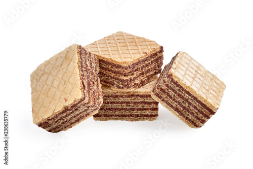 Pile of square wafer biscuits isolated on white backdrop.