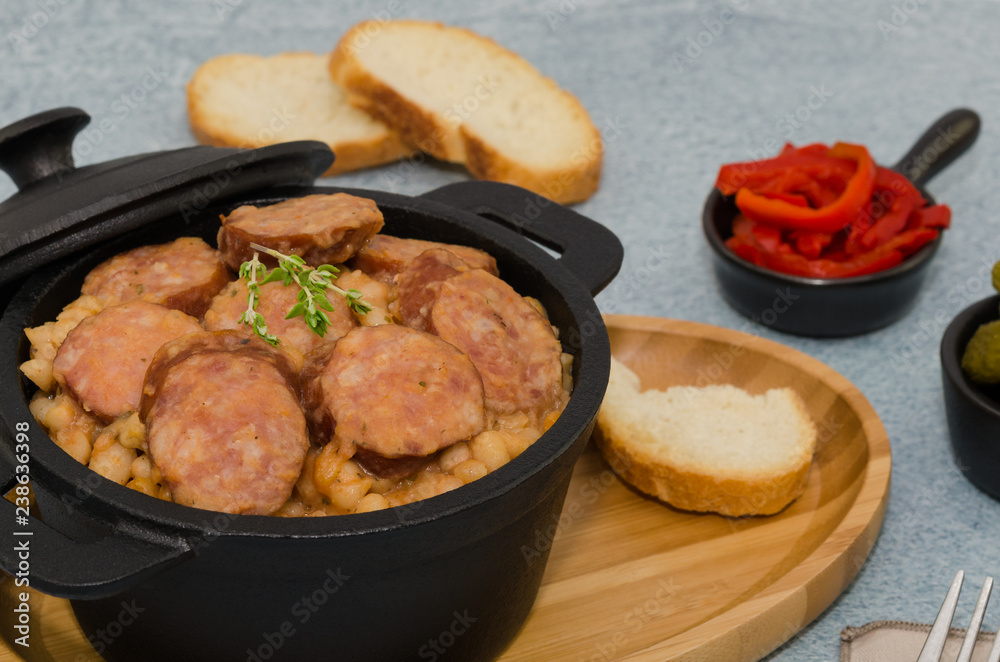 Cassoulet. Baked beans and sausages. Sausage cassoulet.  