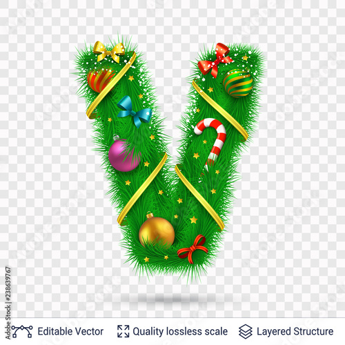 Holiday decorative letter of fir tree with toys. photo