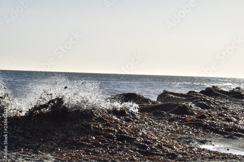 waves breaking on the rocks © Rachid